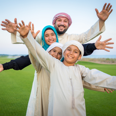 Arabic family on green meadow in nature_edited1