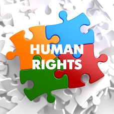 Human Rights on Multicolor Puzzle on White Background