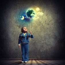Image of little cute girl with globe